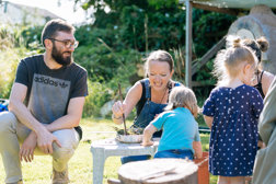 Stock Photo of Young Children and Adults Outdoors